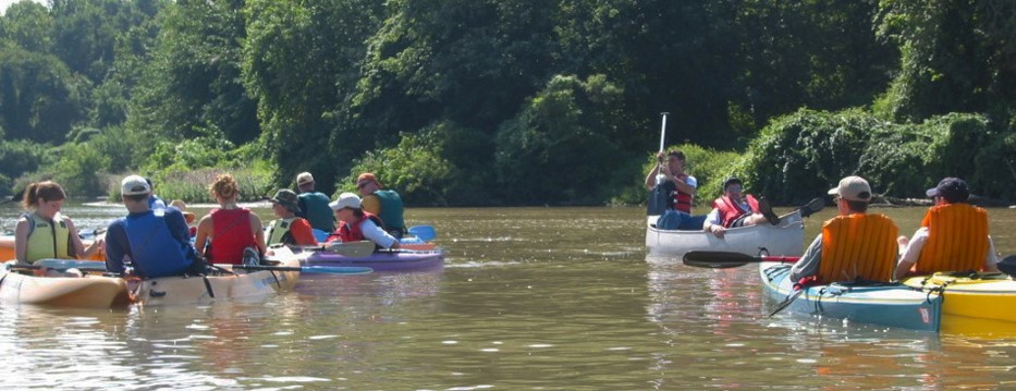 Group of kayakers paddling on Yellow Breeches Creek. 