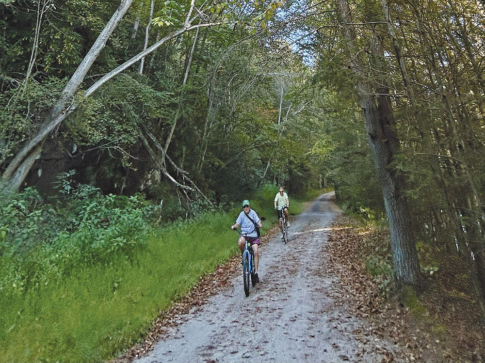 Bikers on the D&L Trail near Rockport Access on the Lehigh River, Carbon County.